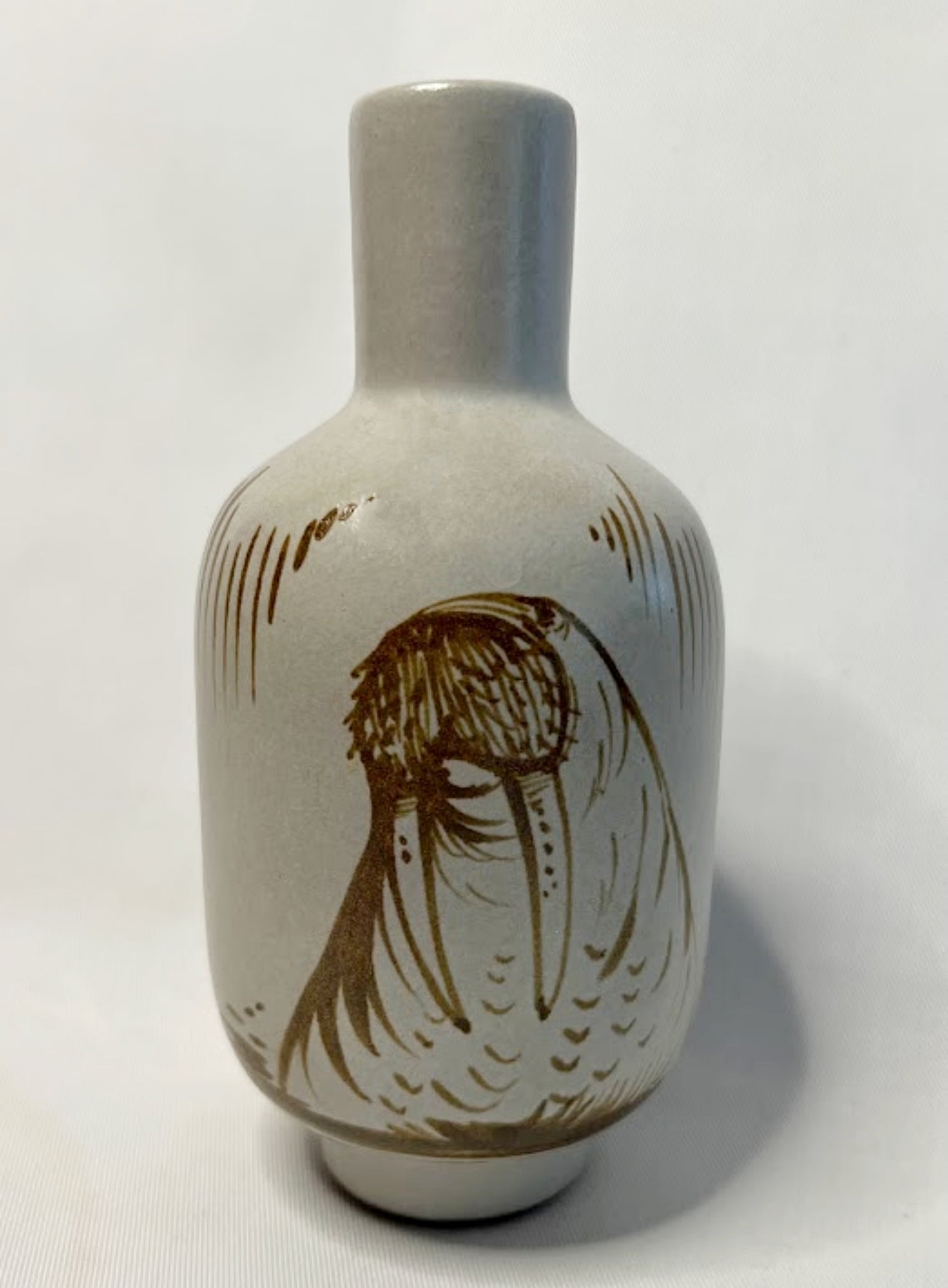 Alaska Art Hand Painted Pottery Walrus Vase on white background