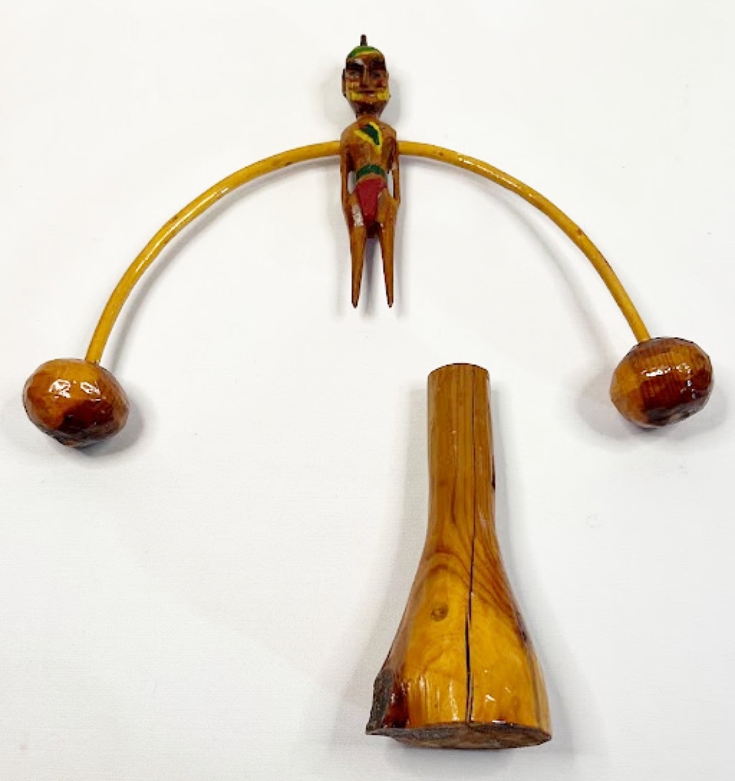 Folk Art Wood Balance Toy of a Native American shown apart
