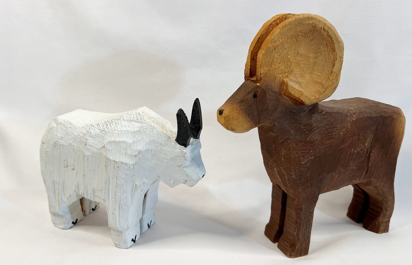 Folk Art Goat and Sheep Chain Saw Carvings