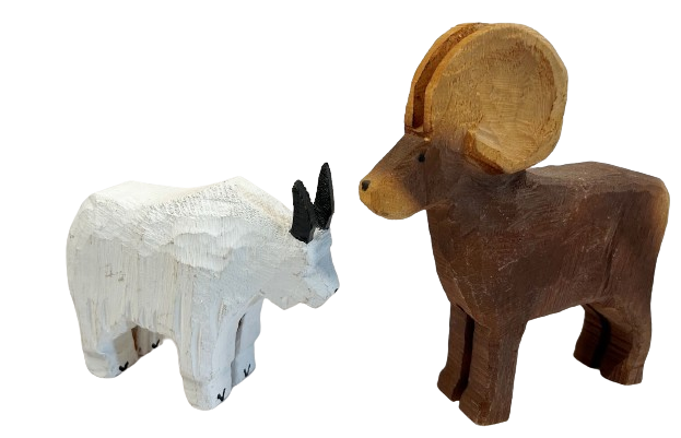 Folk Art Goat and Sheep Chain Saw Carvings