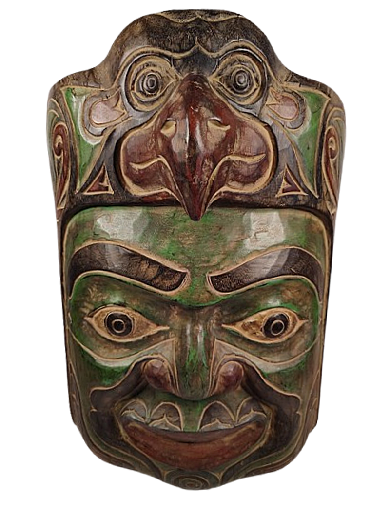 A superb older Kwakwaka'wakw* cedar portrait mask, this hand carved First Nations artwork portrays a tribal man with an eagle headdress