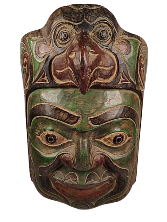 A superb older Kwakwaka'wakw* cedar portrait mask, this hand carved First Nations artwork portrays a tribal man with an eagle headdress