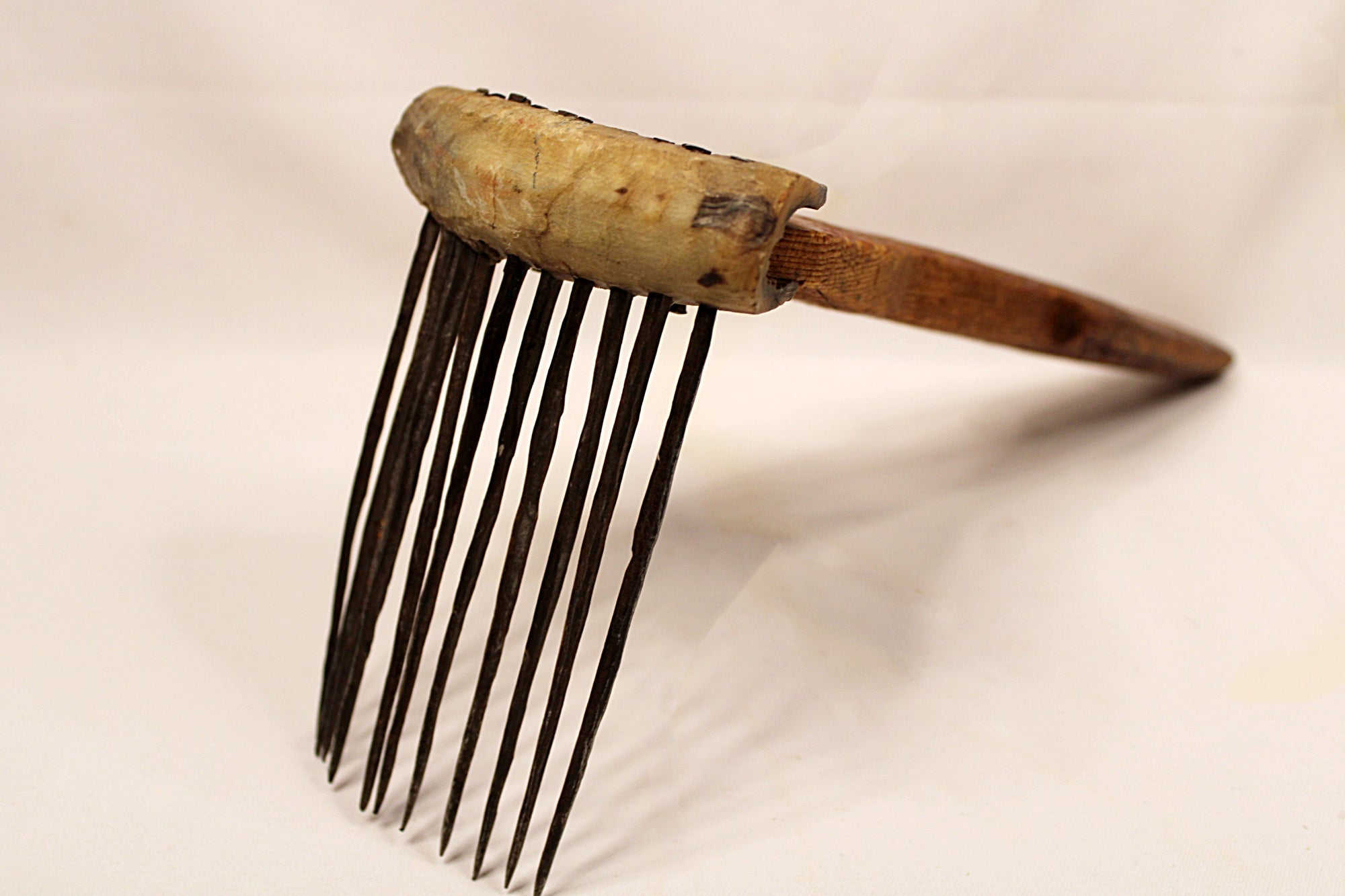 African Textile Tool Wooden Carved Fiber Comb with Forged Iron Spikes Closeup