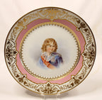 Decorative plate with a portrait of a young boy Napoleonll on a white background
