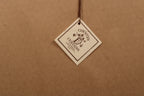 Label with 'Country Curtains' branding on a brown background