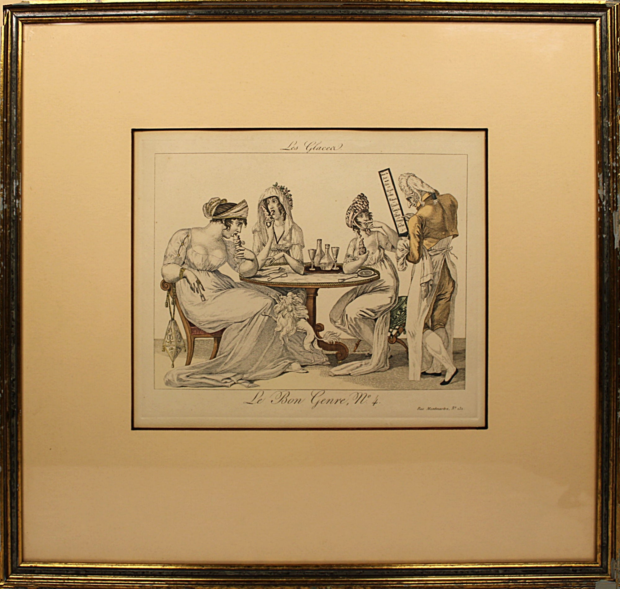 Framed artwork depicting classical scene with figures around a table.