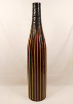 Tessuto Vase with striped design on a white background