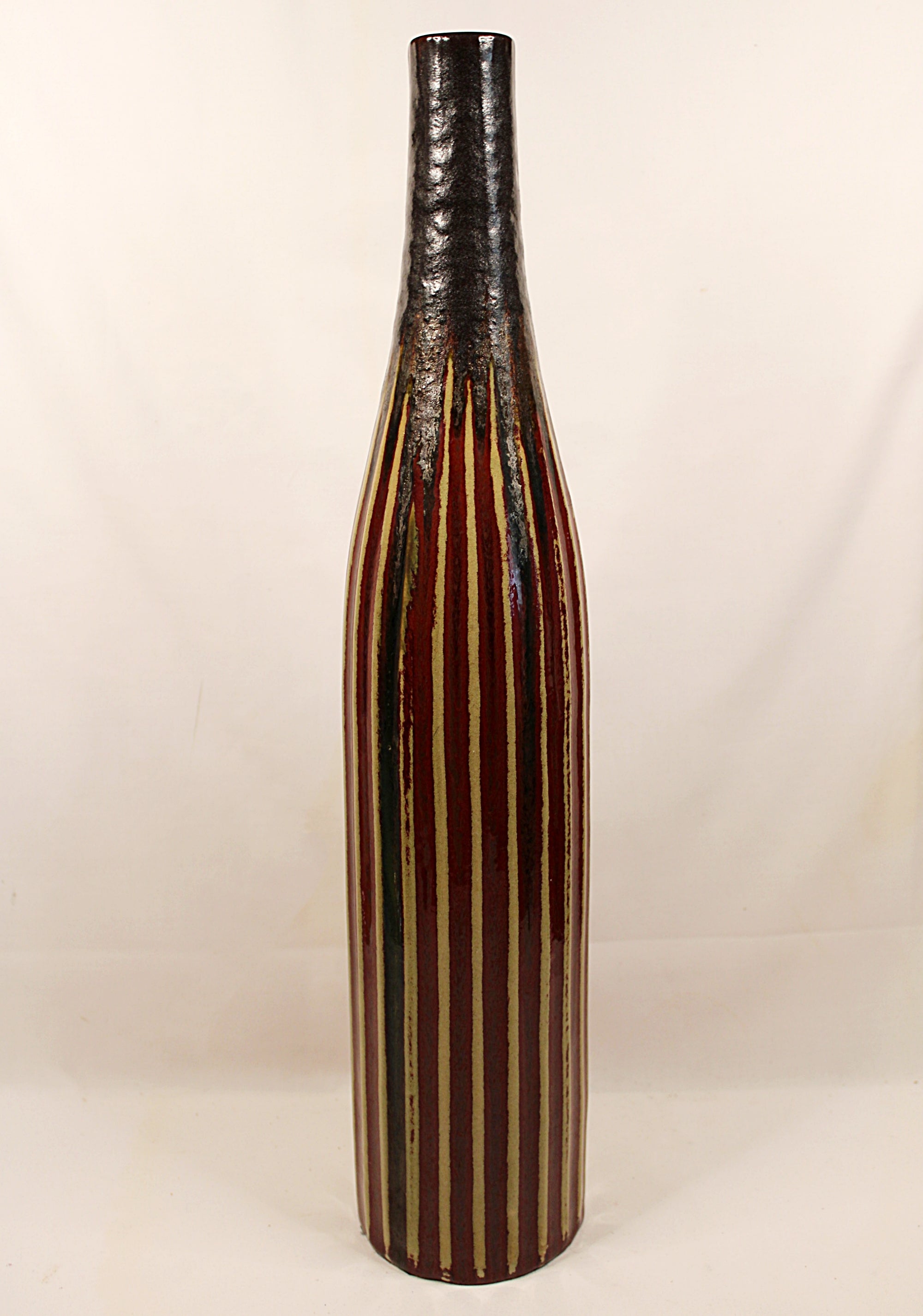 Tessuto Vase with striped design on a white background