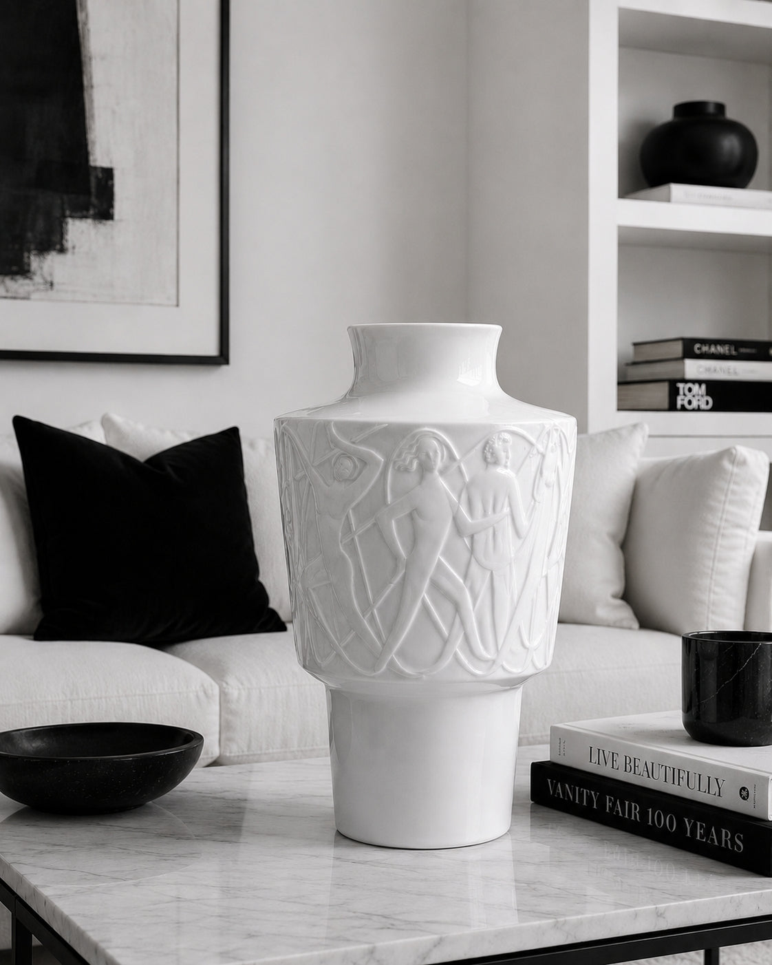 Decorative white vase on a coffee table in a Black and White living room setting