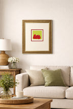 Living room with a framed artwork on the wall above a sofa. Oregon Artist Candace Primack Framed Print